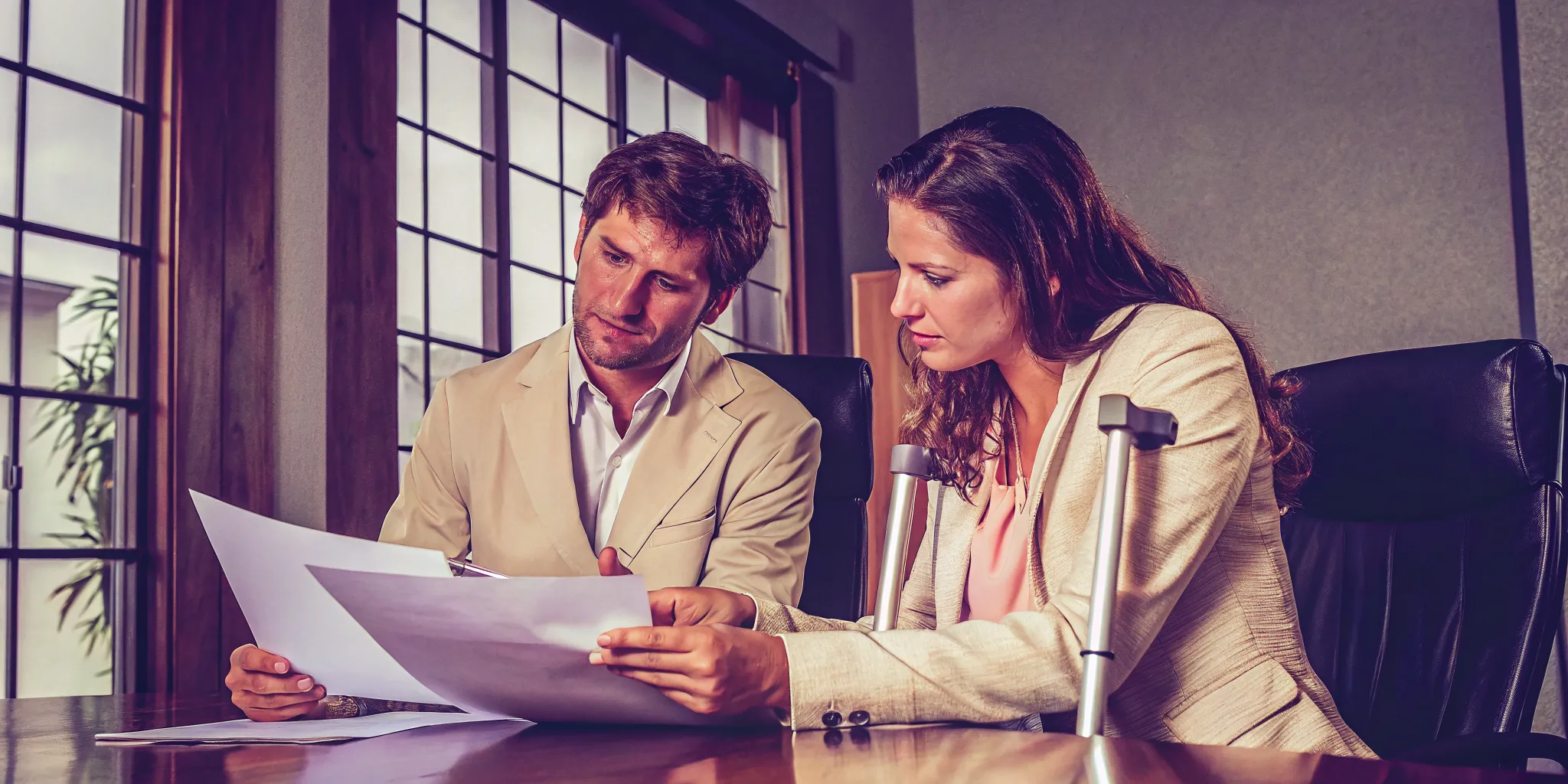 Advisor reviewing transparent pre settlement funding terms with a plaintiff